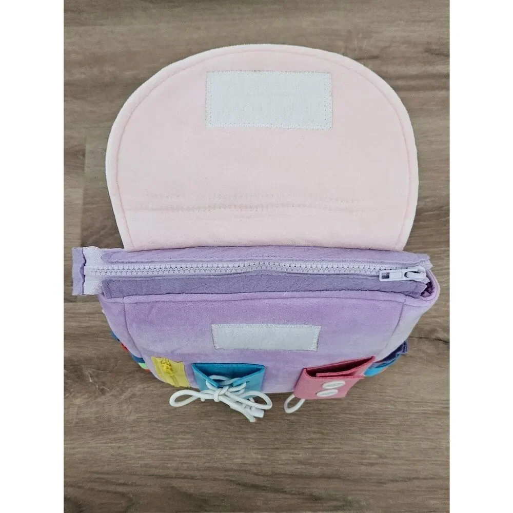 White Dolphin Toys Kids Busy Board Backpack in Lavender and Pink